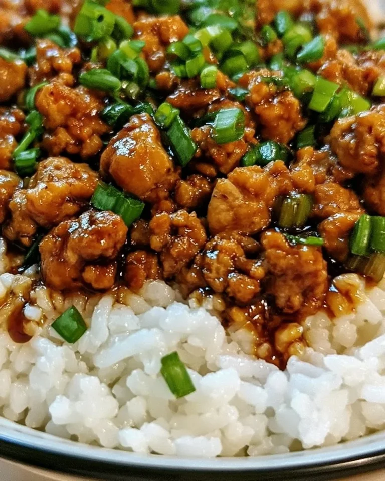 Honey garlic ground turkey cooked with a sweet and savory glaze in a pan.
