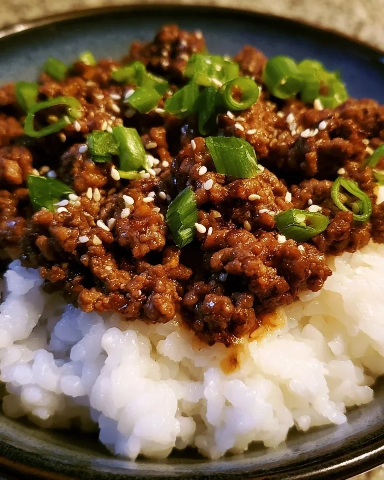 Delicious Korean Ground Beef Bowl topped with fresh vegetables and sesame seeds